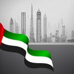 UAEの国旗と都市のシルエット